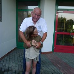 Uncle Larry is torturing Sammy. I am sure he asked for it.